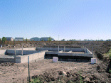 Front of the house with the finished foundation.